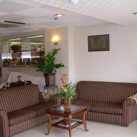 Caritas Lodge Цзюлун Экстерьер фото