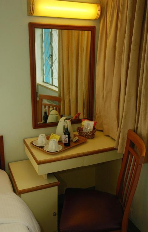 Caritas Lodge Цзюлун Номер фото