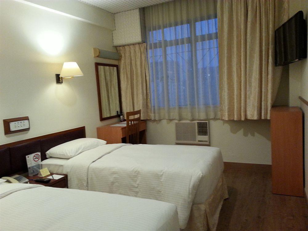 Caritas Lodge Цзюлун Экстерьер фото