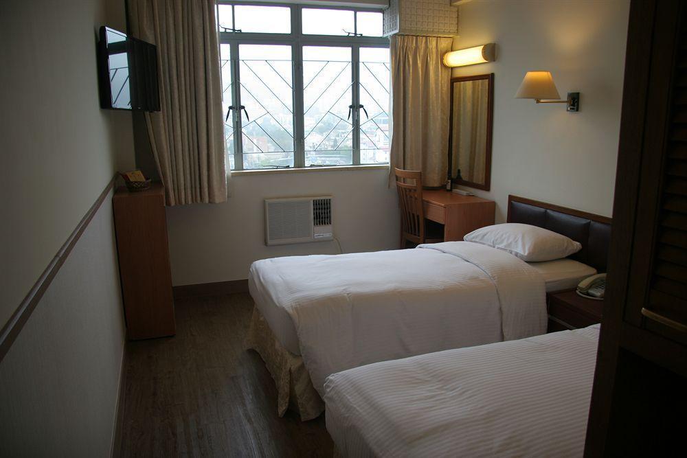 Caritas Lodge Цзюлун Экстерьер фото