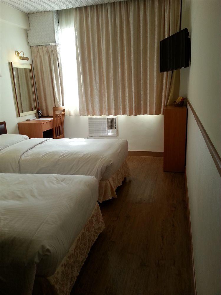 Caritas Lodge Цзюлун Экстерьер фото